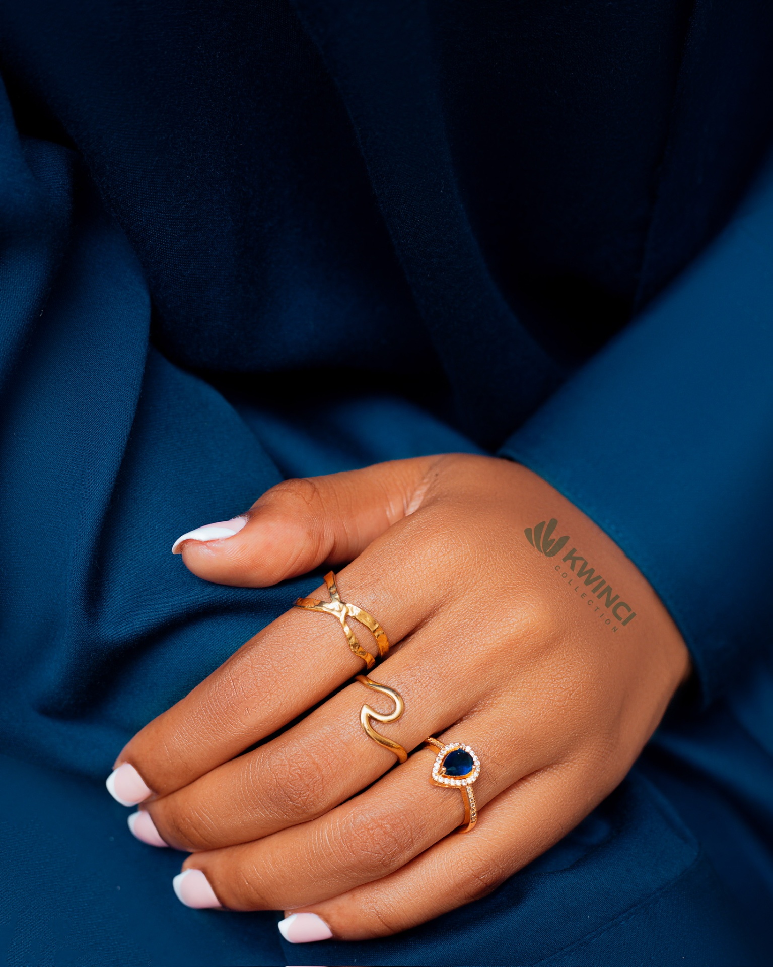 Stacked rings with blue stones